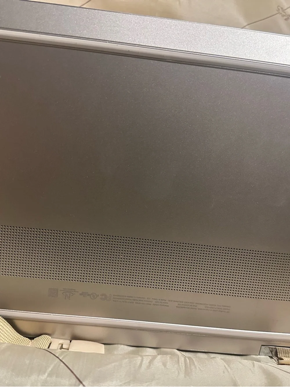 HP Silver Laptop with Charger and Sleek HP Logo